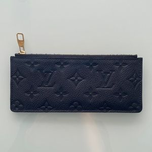 Louis Vuitton Coin Pouch
Monogram Empreinte Leather